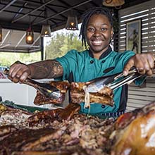 Slow smoked whole hog in the Par 3 Smoked BBQ